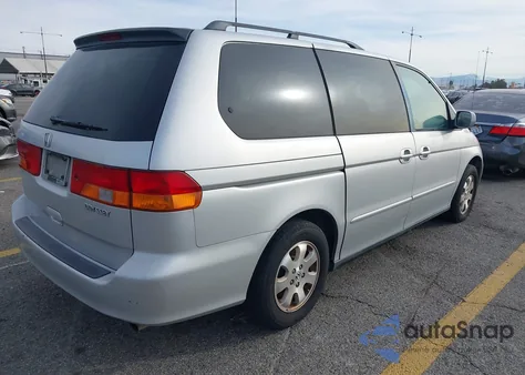 2003 Honda Odyssey Ex-L z USA, uszkodzony, nr VIN 5FNRL18933B117892